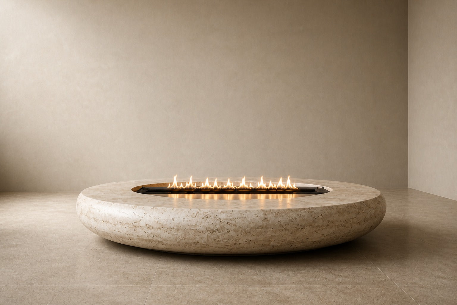 Pale fossil travertine fire bowl Bruna Ø180, pale cream with dense fossil shell, on a pale stone floor.
