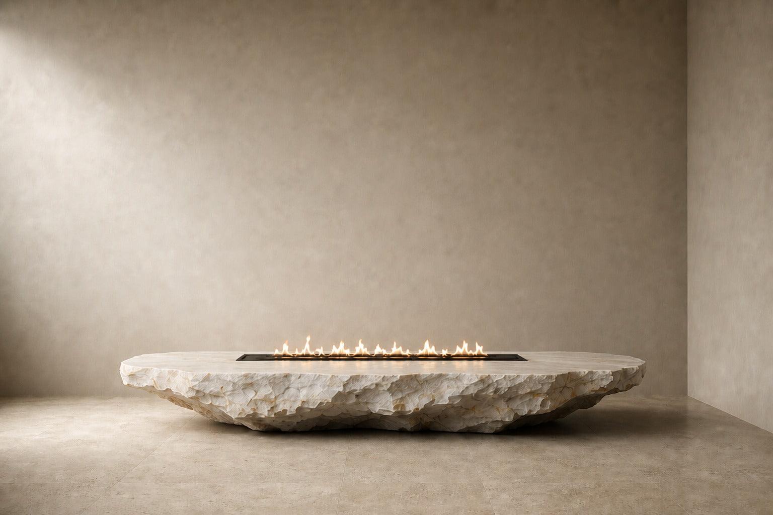 White quartzite fire table Himara 220, bright white with warm inclusions, on a pale stone floor.