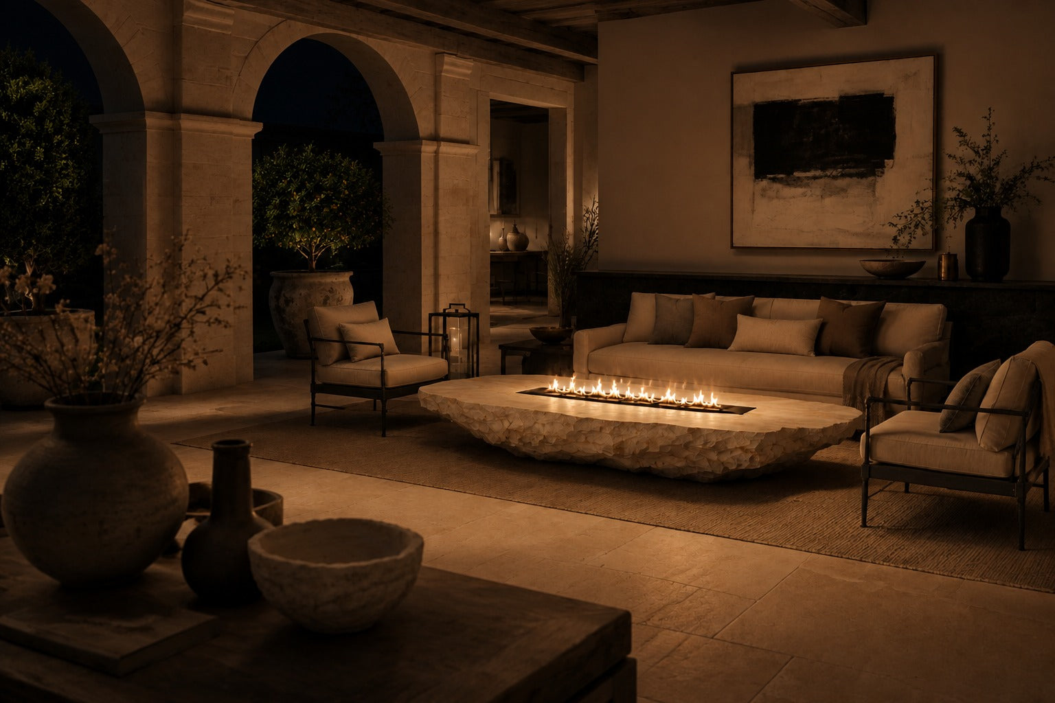 White quartzite fire table Himara 220, bright white with warm inclusions, on a pale stone floor.