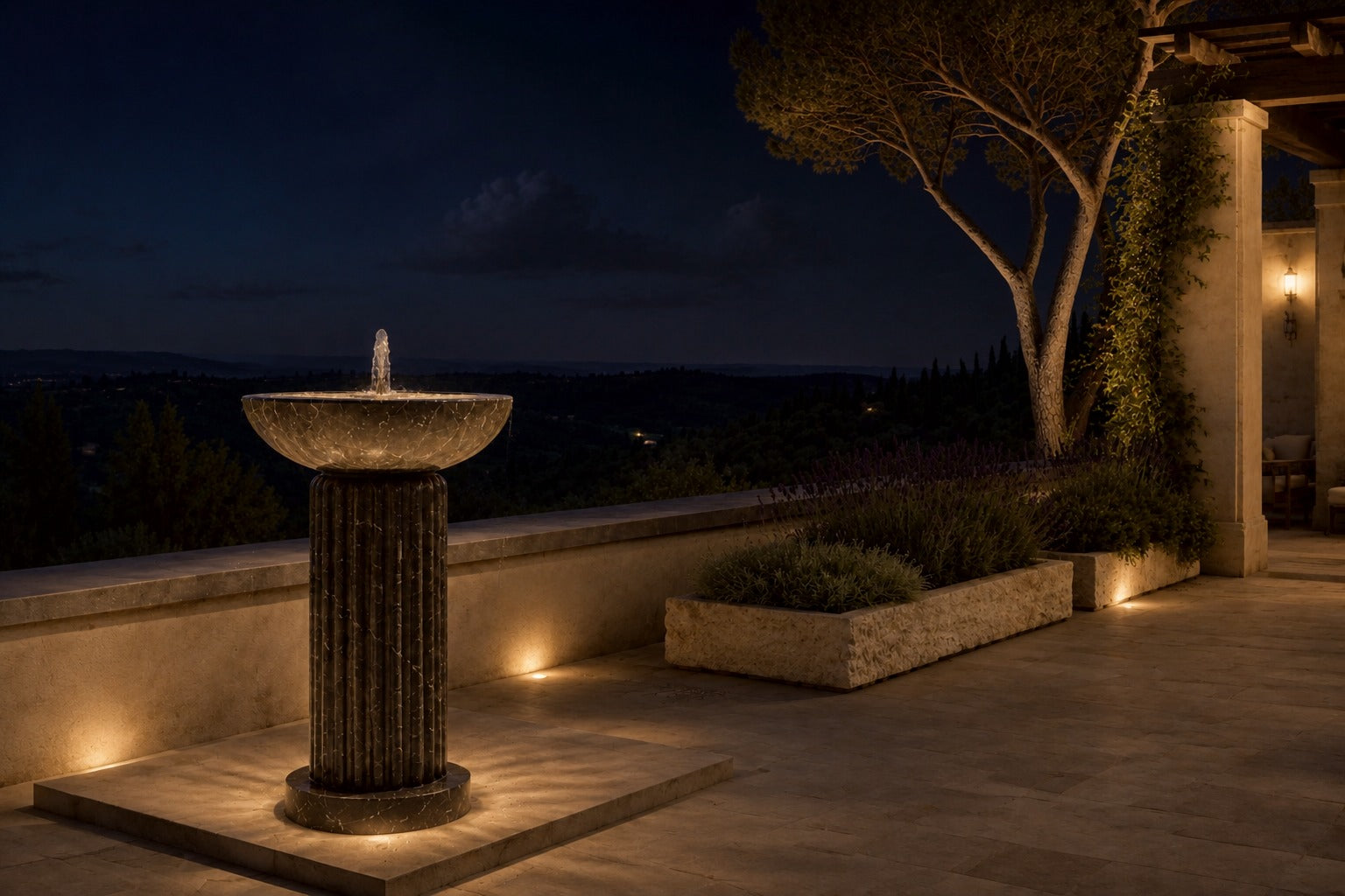 Dark marble pedestal fountain Layla Ø65, deep black with white veining, on a pale stone floor.