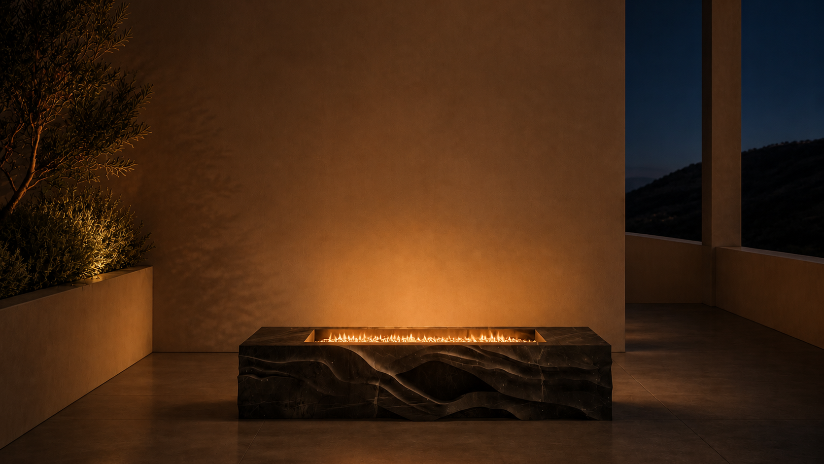 Ombria pietra grey marble fireplace by 1-OPH lit at night