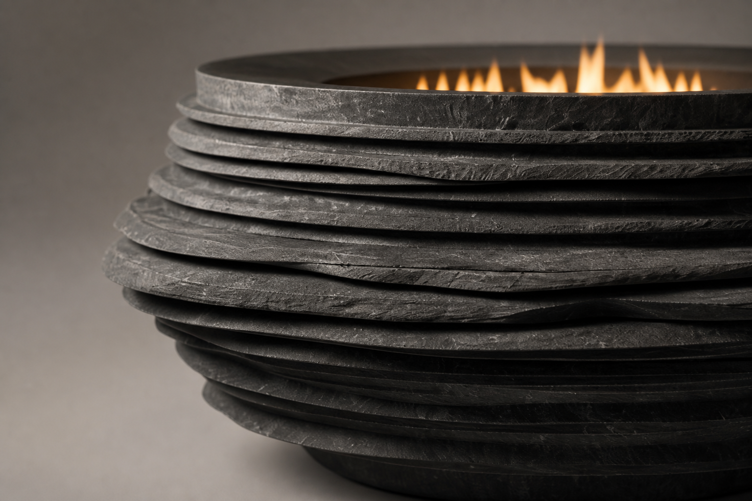 Caldera black stone fireplace by 1-OPH surface detail