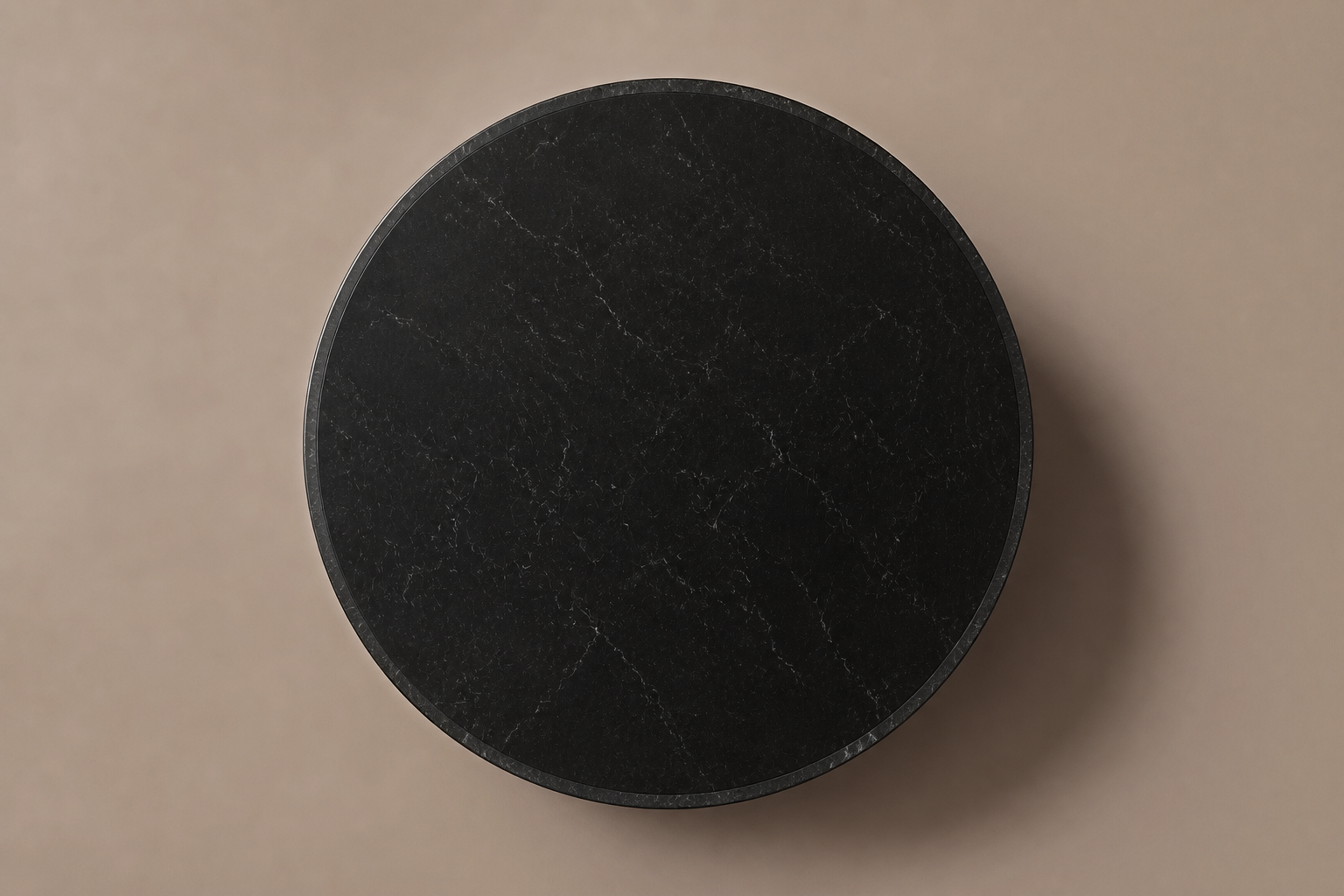 Circular Shadow-Gap Base Low black marble plinth base by 1-OPH, overhead view