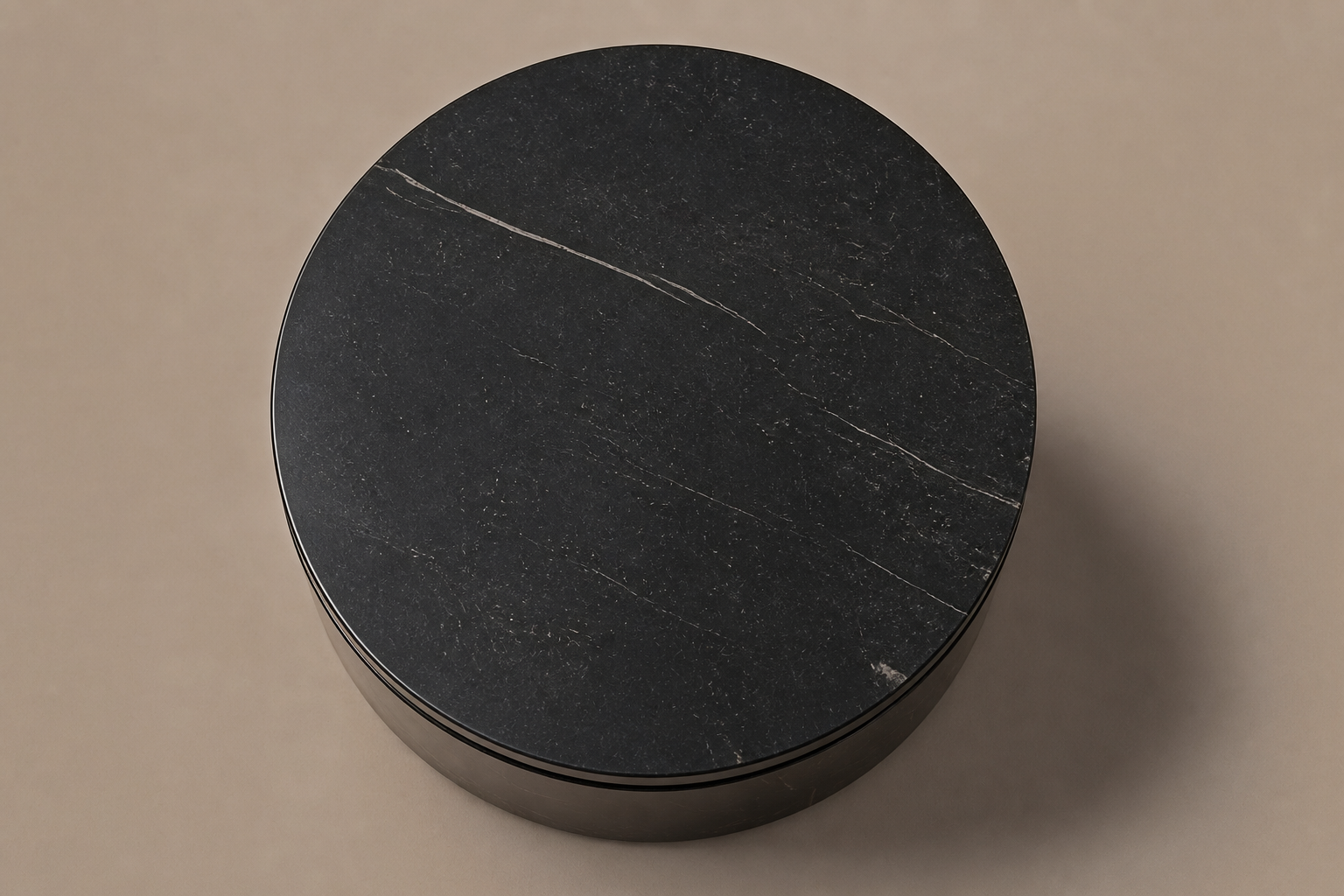 Circular Shadow-Gap Base Tall black marble plinth base by 1-OPH, overhead view