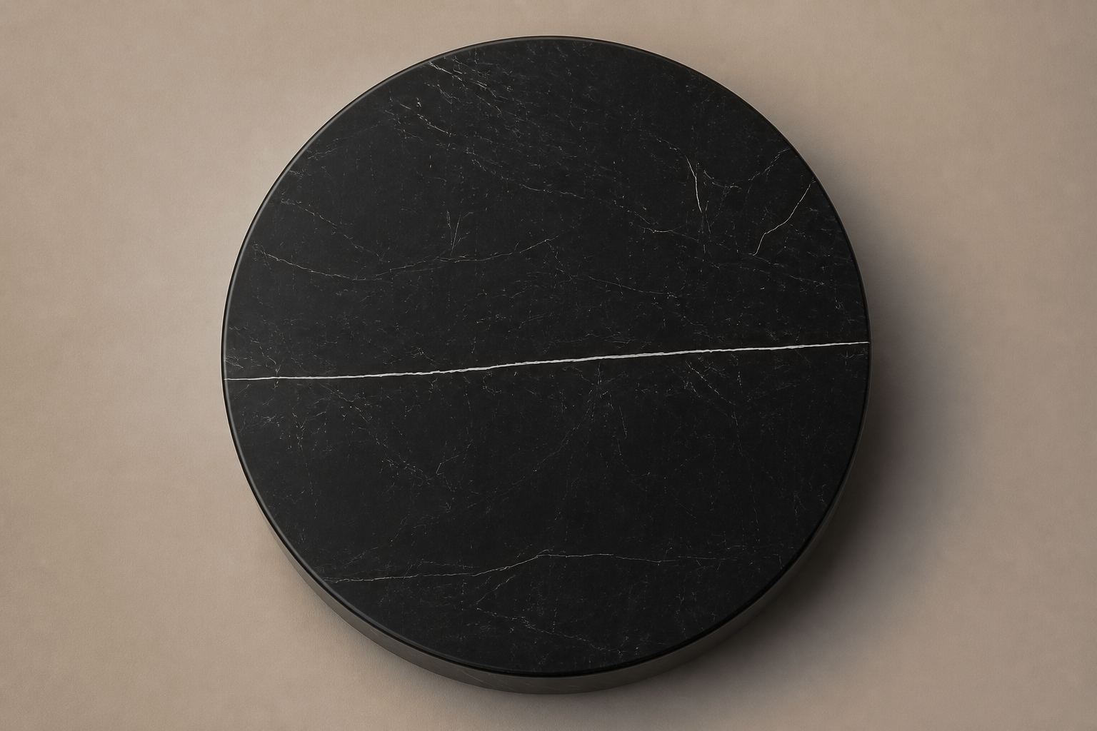 Circular Shadow-Gap Base Disc black marble plinth base by 1-OPH, overhead view