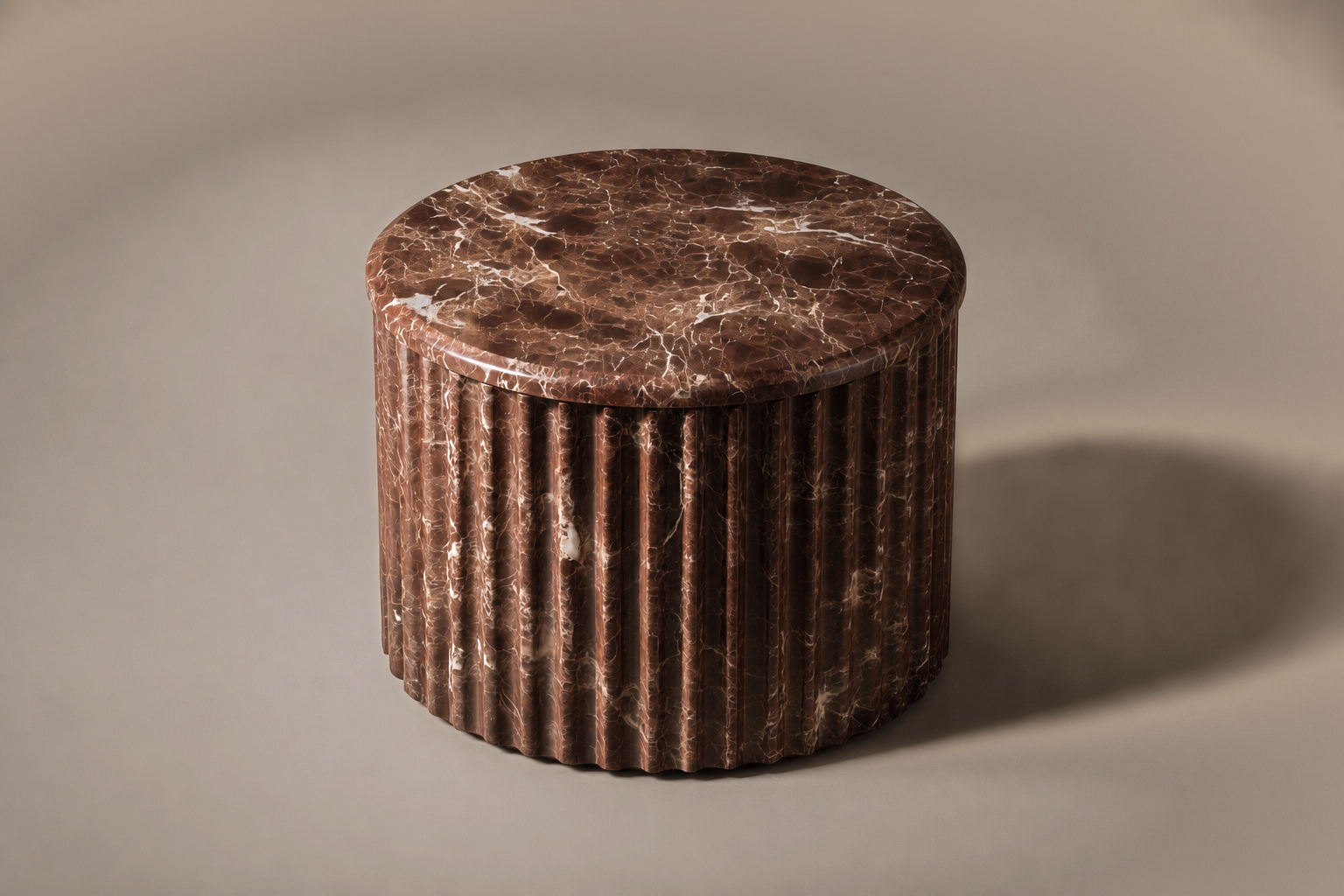 Emperador Fluted Drum Tall emperador dark marble plinth base by 1-OPH, three-quarter studio view
