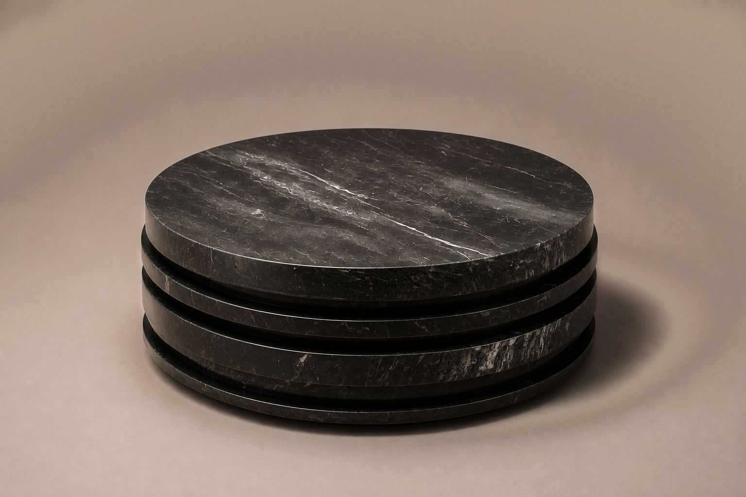 Stacked Disc Base Deep black marble plinth base by 1-OPH, three-quarter studio view