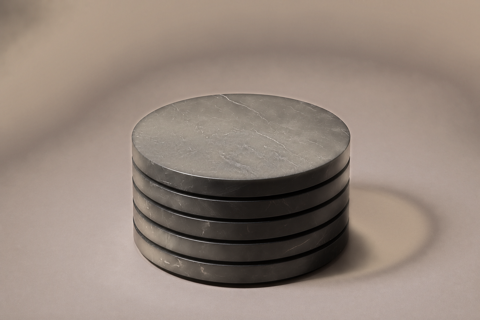 Stacked Disc Base Slim black marble plinth base by 1-OPH, three-quarter studio view