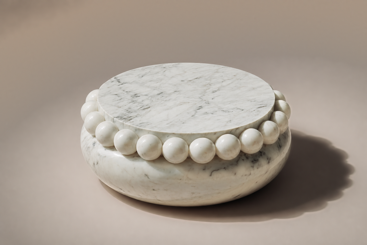 Carrara Beaded Pillow Base black marble plinth base by 1-OPH, three-quarter studio view