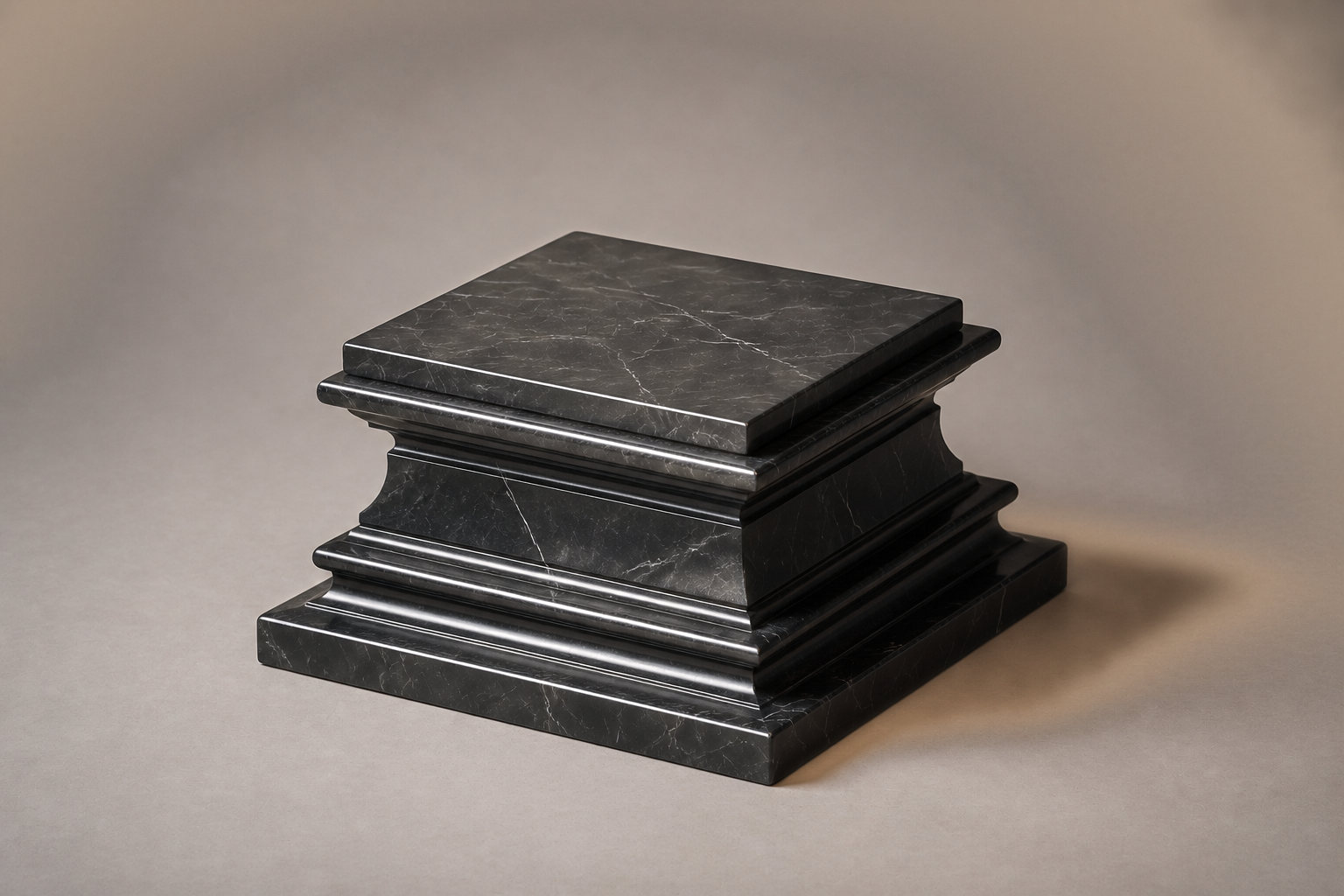 Stepped Plinth Base black marble plinth base by 1-OPH, three-quarter studio view