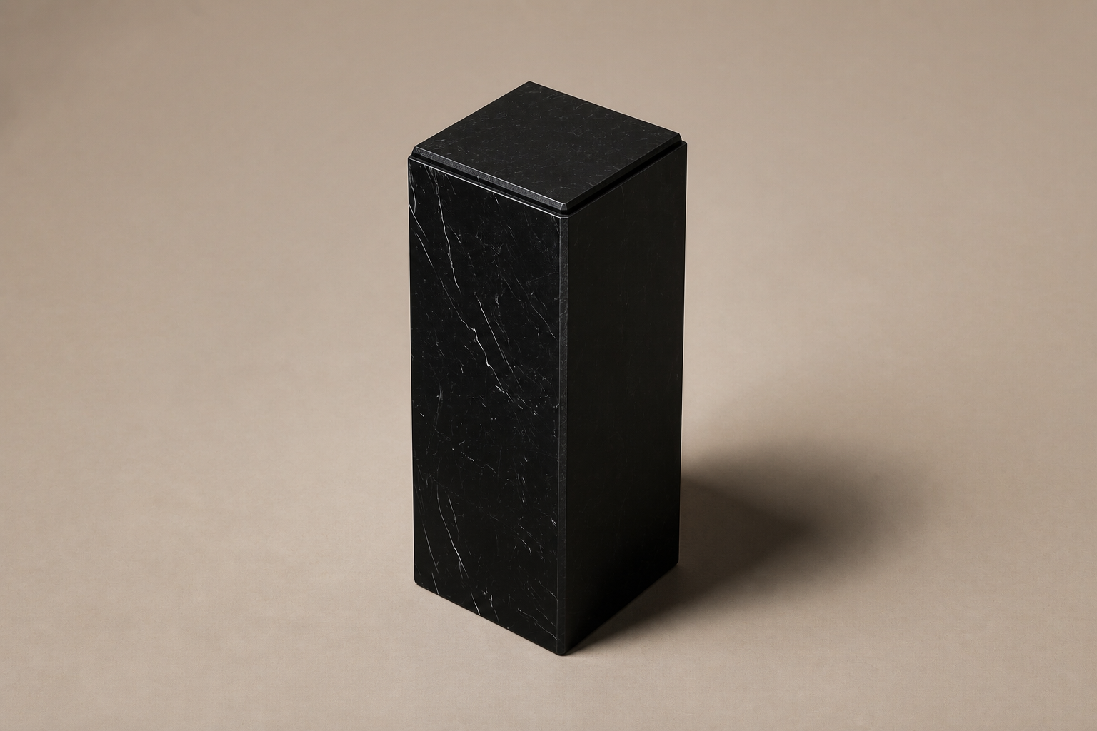 Beveled Monolith Base Column black marble plinth base by 1-OPH, three-quarter studio view