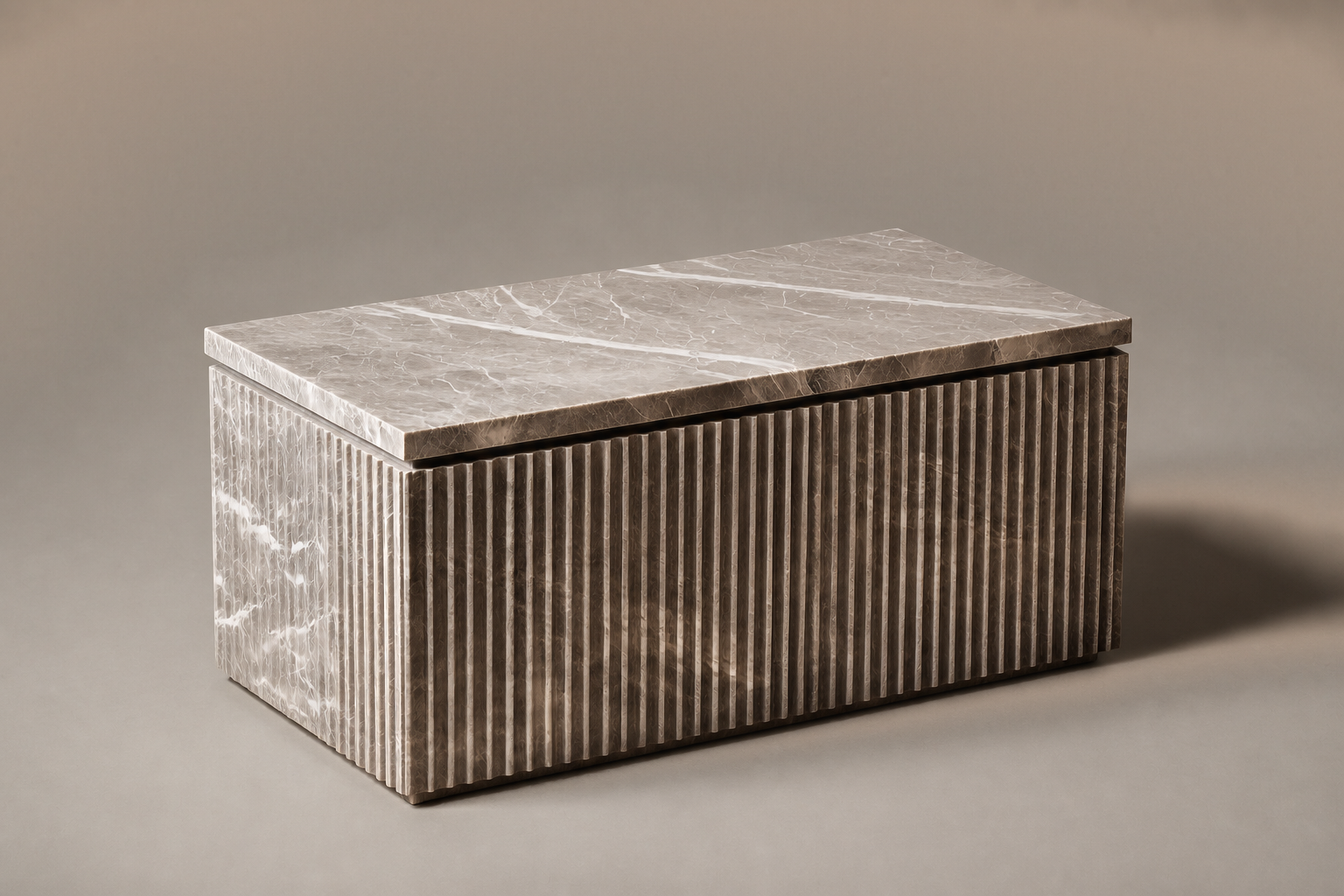 Pietra Grey Reeded Base Warm pietra grey marble plinth base by 1-OPH, three-quarter studio view