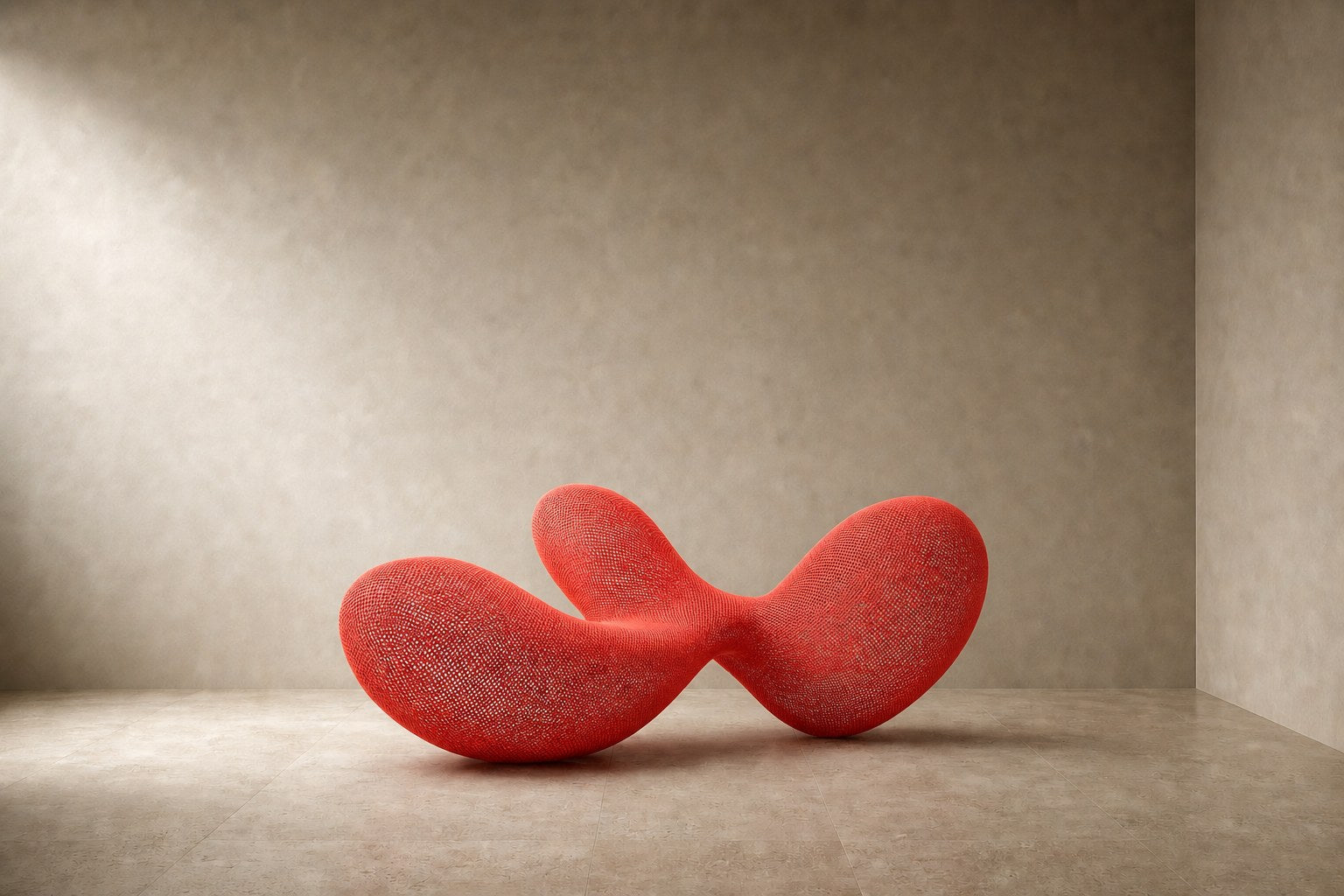 Coral red woven wire sculpture Zaurak, two full lobes drawn together through a narrow twist at the centre.
