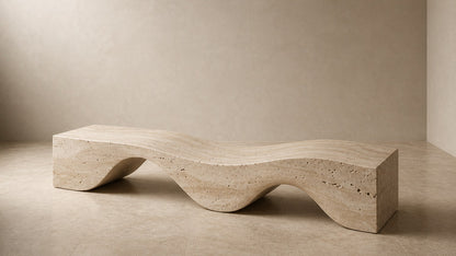 Travertine bench Hudu 180, warm cream with open pitting, on a pale stone floor.