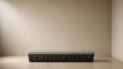 Green marble bench Layan 180, pale green seat, blackened base, on a pale stone floor.
