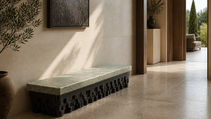 Green marble bench Layan 180, pale green seat, blackened base, on a pale stone floor.