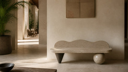 Cream stone bench Quieto 180, warm cream, blackened cone, on a pale stone floor.