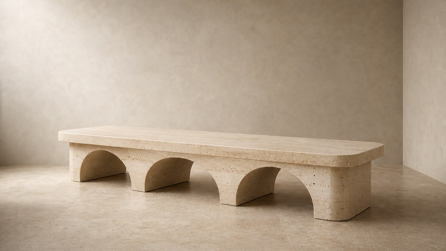 Limestone bench Reposo 180, warm cream, on a pale stone floor.