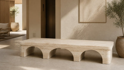 Limestone bench Reposo 180, warm cream, on a pale stone floor.