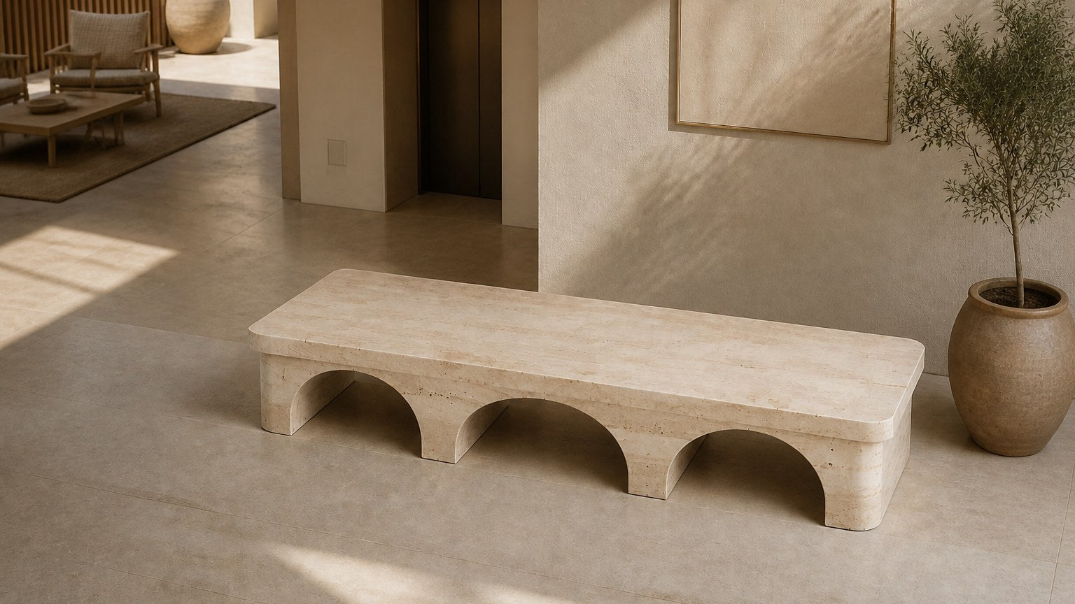 Limestone bench Reposo 180, warm cream, on a pale stone floor.