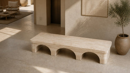 Limestone bench Reposo 180, warm cream, on a pale stone floor.