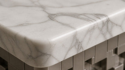 White marble bench Sabat 180, white with grey veining, pale base, on a pale stone floor.