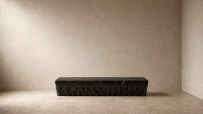 Black marble bench Samt 180, deep black with white veining, on a pale stone floor.