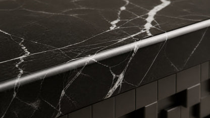 Black marble bench Samt 180, deep black with white veining, on a pale stone floor.