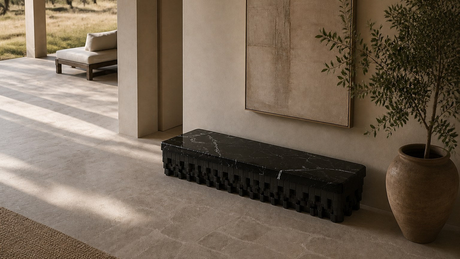 Black marble bench Samt 180, deep black with white veining, on a pale stone floor.
