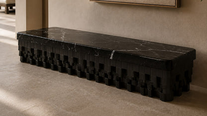 Black marble bench Samt 180, deep black with white veining, on a pale stone floor.