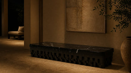 Black marble bench Samt 180, deep black with white veining, on a pale stone floor.