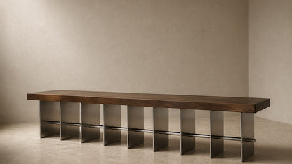 Timber and steel bench Tomari 240, dark walnut seat, brushed steel legs, on a pale stone floor.