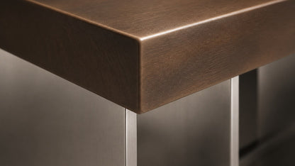 Timber and steel bench Tomari 240, dark walnut seat, brushed steel legs, on a pale stone floor.