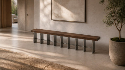 Timber and steel bench Tomari 240, dark walnut seat, brushed steel legs, on a pale stone floor.