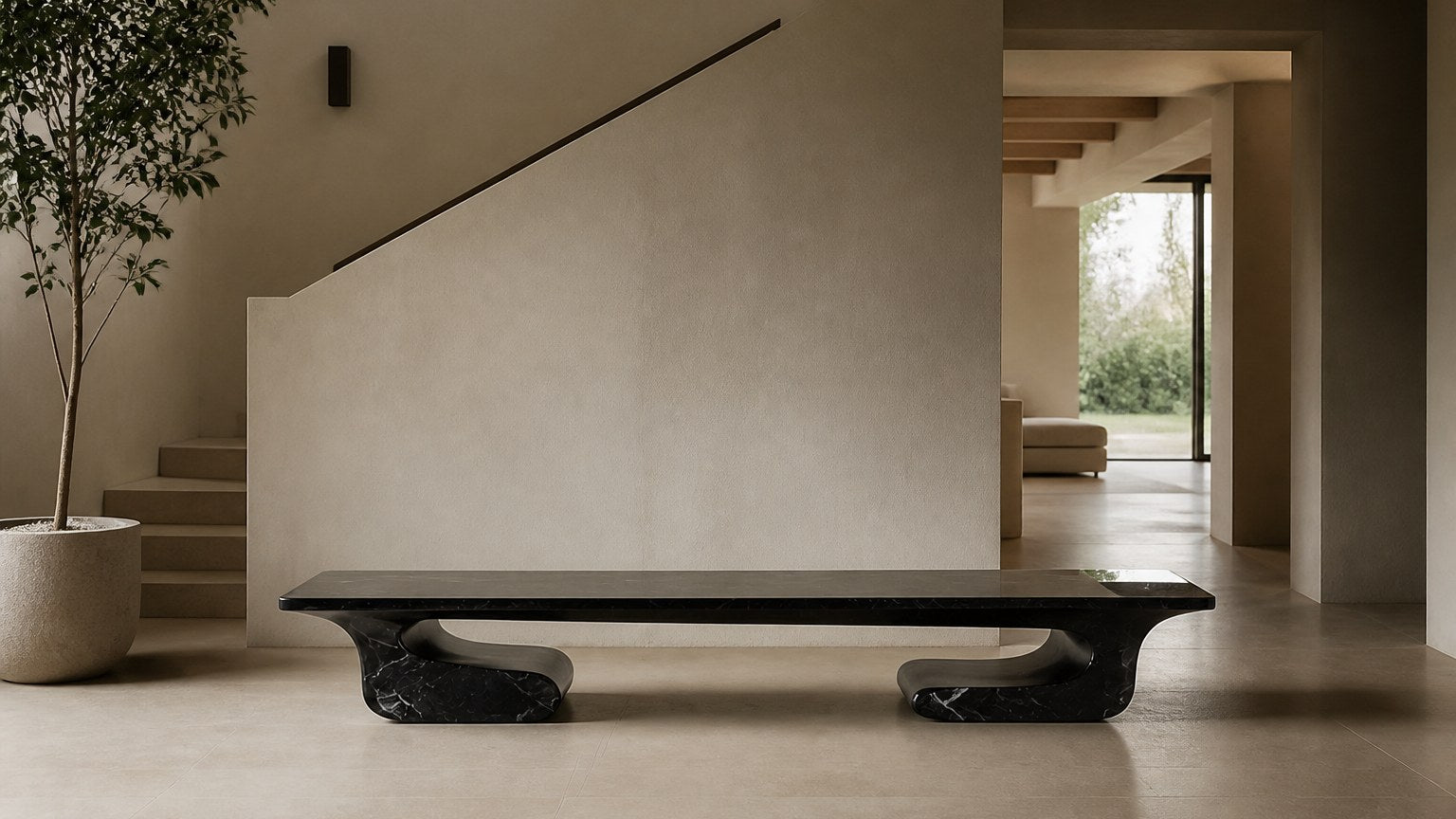 Black stone bench Yutori 180, deep black with white veining, on a pale stone floor.