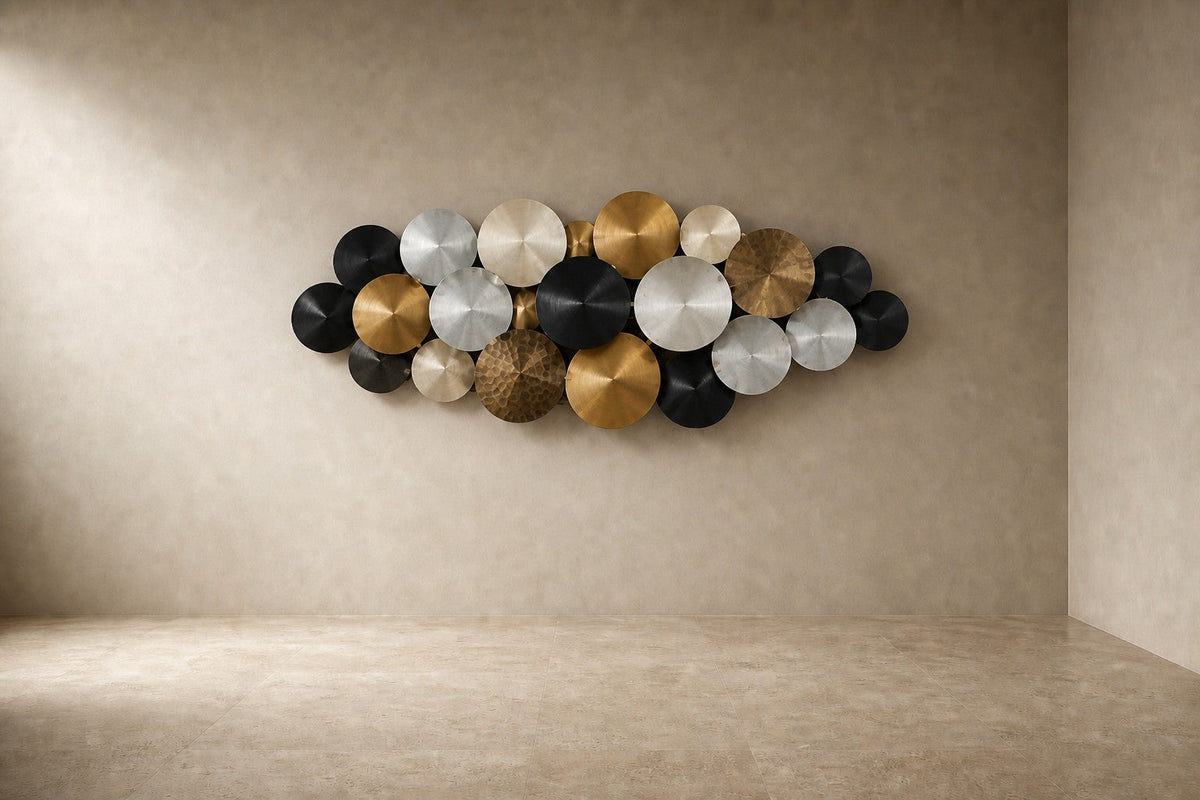 Aqmar — 200 × 80 cm wall cluster of spun discs in black, silver and gold, studio view of the whole piece