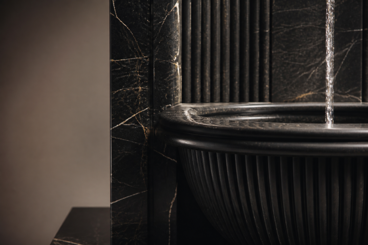 Tsuyu — nero marquina marble wall fountain by 1-OPH