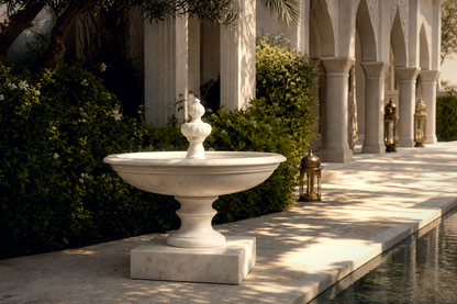 Caserta white marble tiered fountain by 1-OPH, in a Dubai courtyard setting