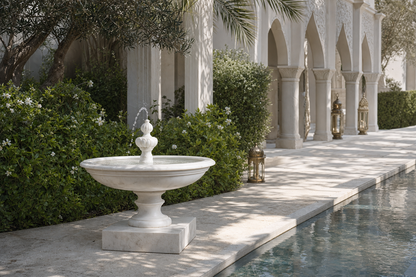Caserta white marble tiered fountain by 1-OPH, in a Dubai courtyard setting
