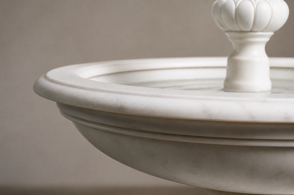 Caserta white marble tiered fountain by 1-OPH, in a Dubai courtyard setting