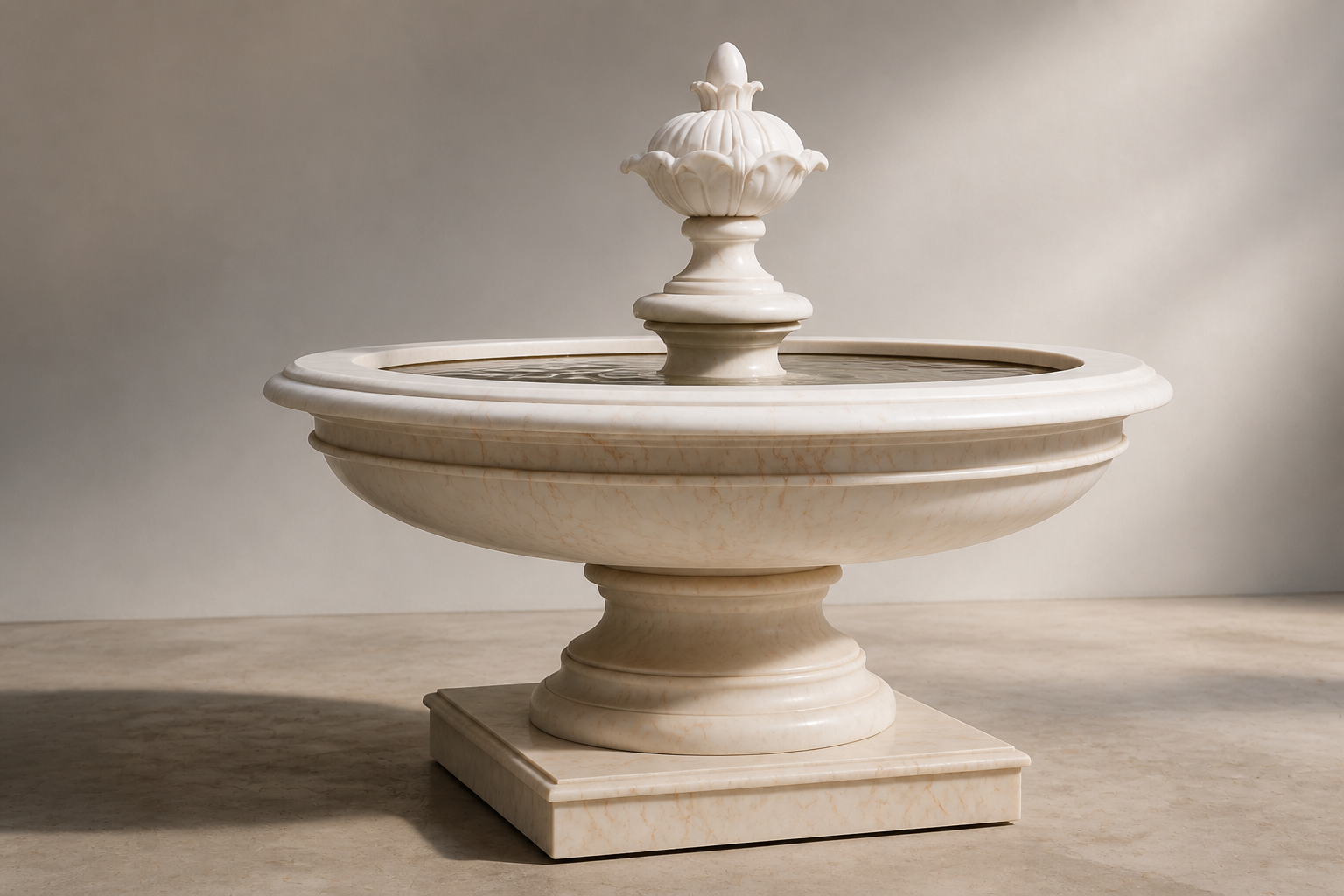 Nemi cream stone tiered fountain by 1-OPH, in a Dubai courtyard setting