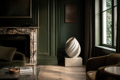 Neva — Limestone egg sculpture by 1-OPH