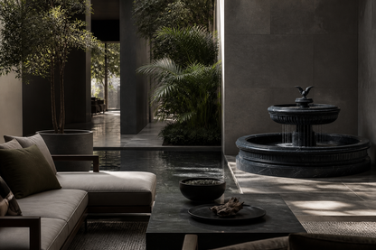 Cascata nero marquina marble tiered fountain by 1-OPH, in a Dubai courtyard setting