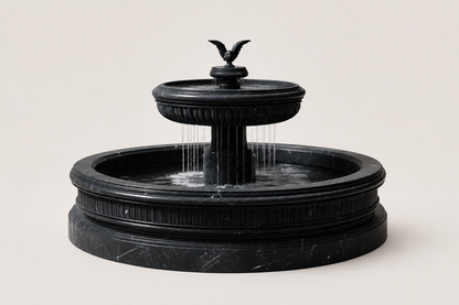 Cascata nero marquina marble tiered fountain by 1-OPH, in a Dubai courtyard setting