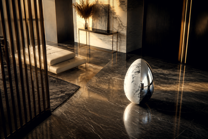 Prima — Marble and stainless steel egg sculpture by 1-OPH