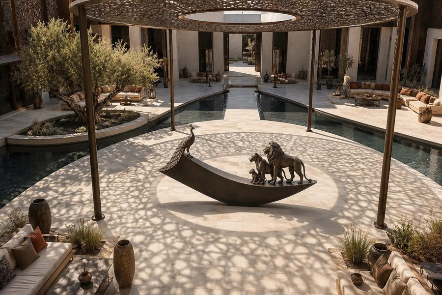 Warm bronze crescent sculpture Barranco balanced on its curve, a standing group at one end and a single raised figure at the other.