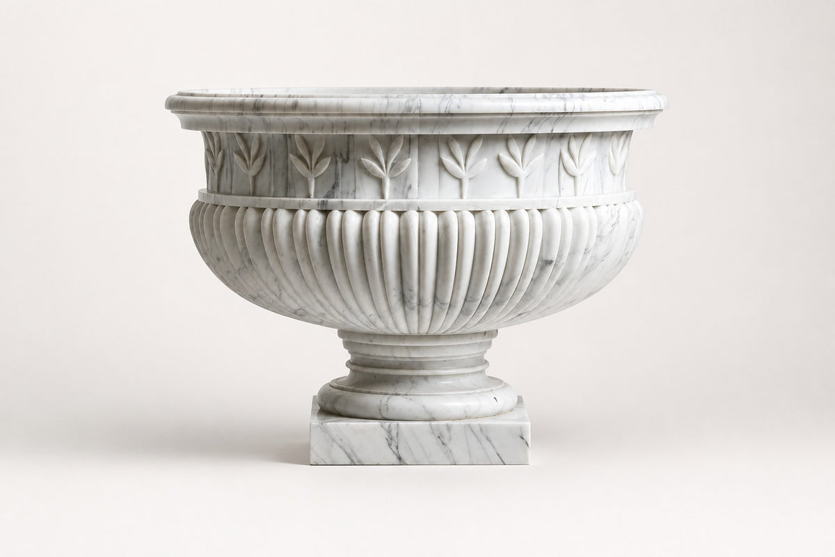 Calacatta Laurel Marble Urn Planter — 80 cm white Calacatta marble urn planter with a laurel-leaf frieze and fluted body, studio view of the whole piece