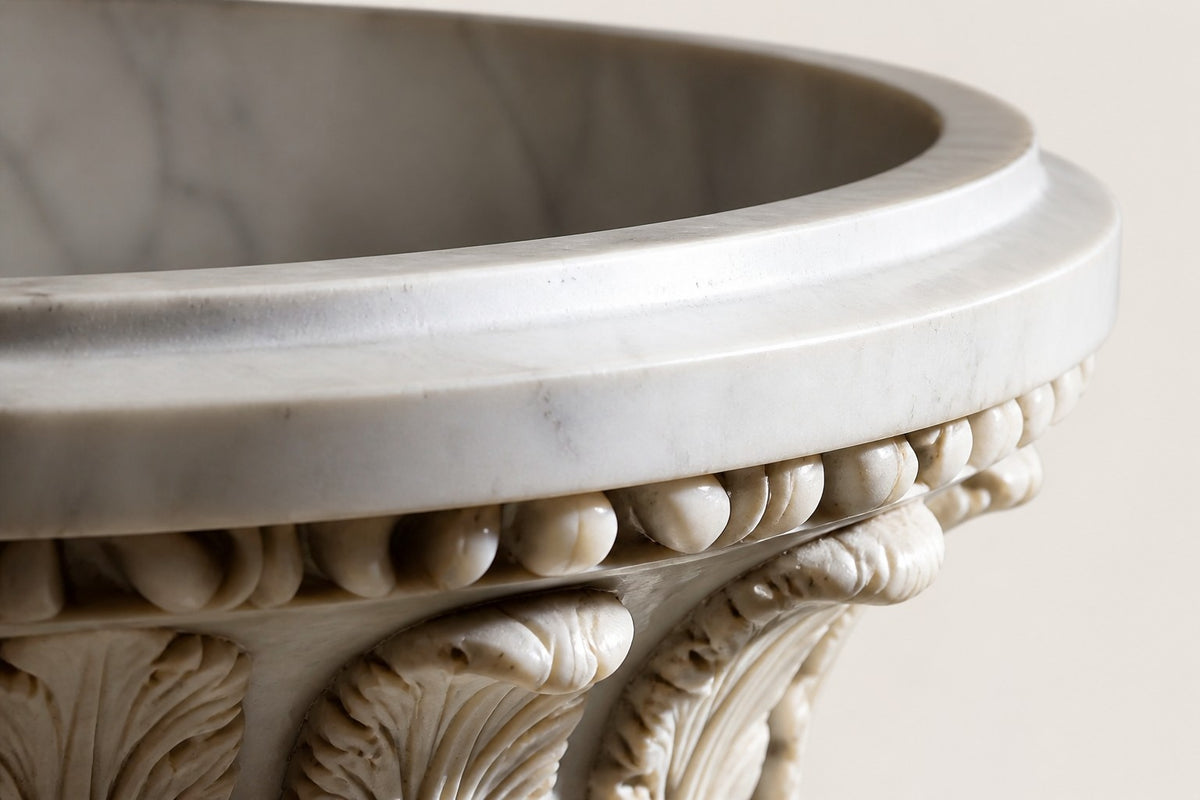 Carrara Acanthus Classical Marble Urn Planter — 90 cm white Carrara marble urn planter with a carved acanthus-leaf frieze on an octagonal plinth, close studio detail of the surface and material