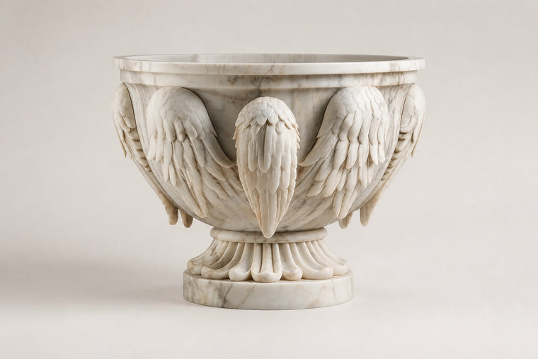 Carrara Winged Marble Urn Planter — 95 cm white Carrara marble urn planter carved with folded wings and an eagle head, studio view of the whole piece