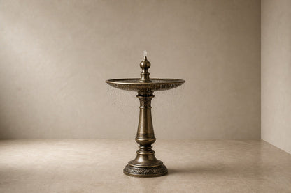 Cascina Ø65 stone pedestal fountain, studio view of the whole piece